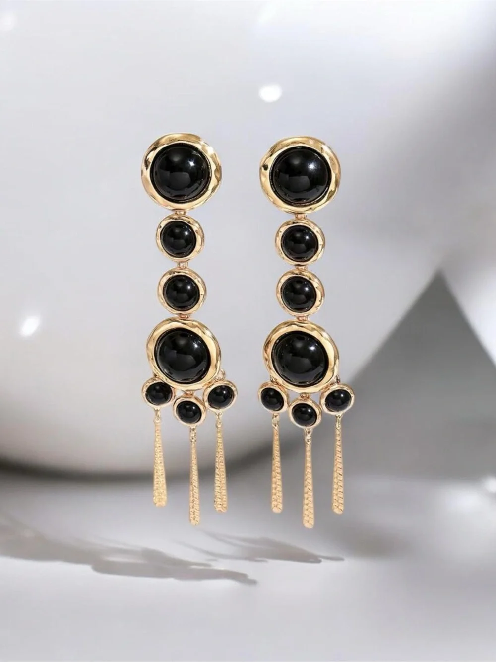 Gold Drop Earrings with Black Stones